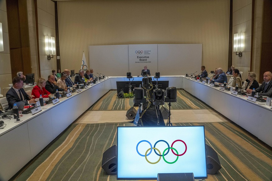 International Olympic Committee (IOC) president Thomas Bach, centre, speaks on the first day of the executive board meeting of the IOC ahead of the upcoming 141st IOC session in Mumbai, India, Thursda ...