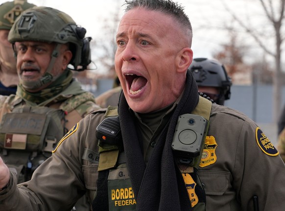 U.S. Border Patrol Cmdr. Gregory Bovino shouts at protesters, Sunday, Jan. 11, 2026, in Minneapolis. (AP Photo/Jen Golbeck)
Immigration Enforcement Minnesota