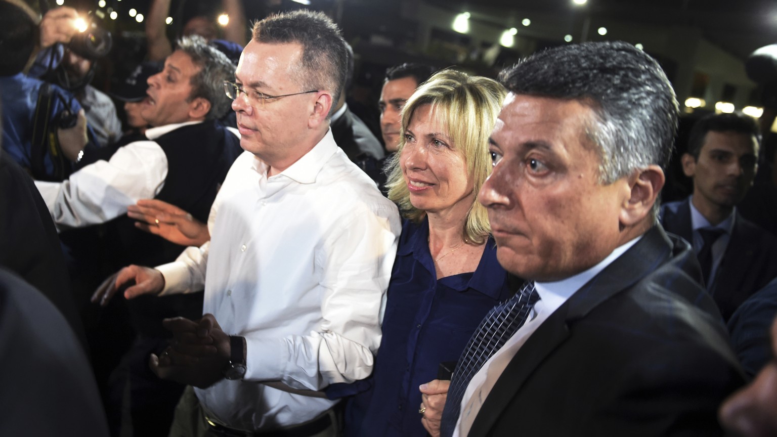 Pastor Andrew Brunson, center left, and his wife Norine Brunson arrive at Adnan Menderes airport for a flight to Germany after his release following his trial in Izmir, Turkey, Friday, Oct. 12, 2018,  ...