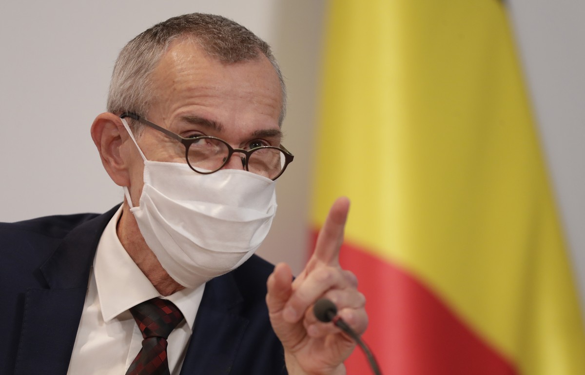Belgium's Minister of Health and Social Affairs Frank Vandenbroucke waits for the start of a media conference, after a committee to discuss new restrictive measures regarding coronavirus, COVID-1 ...