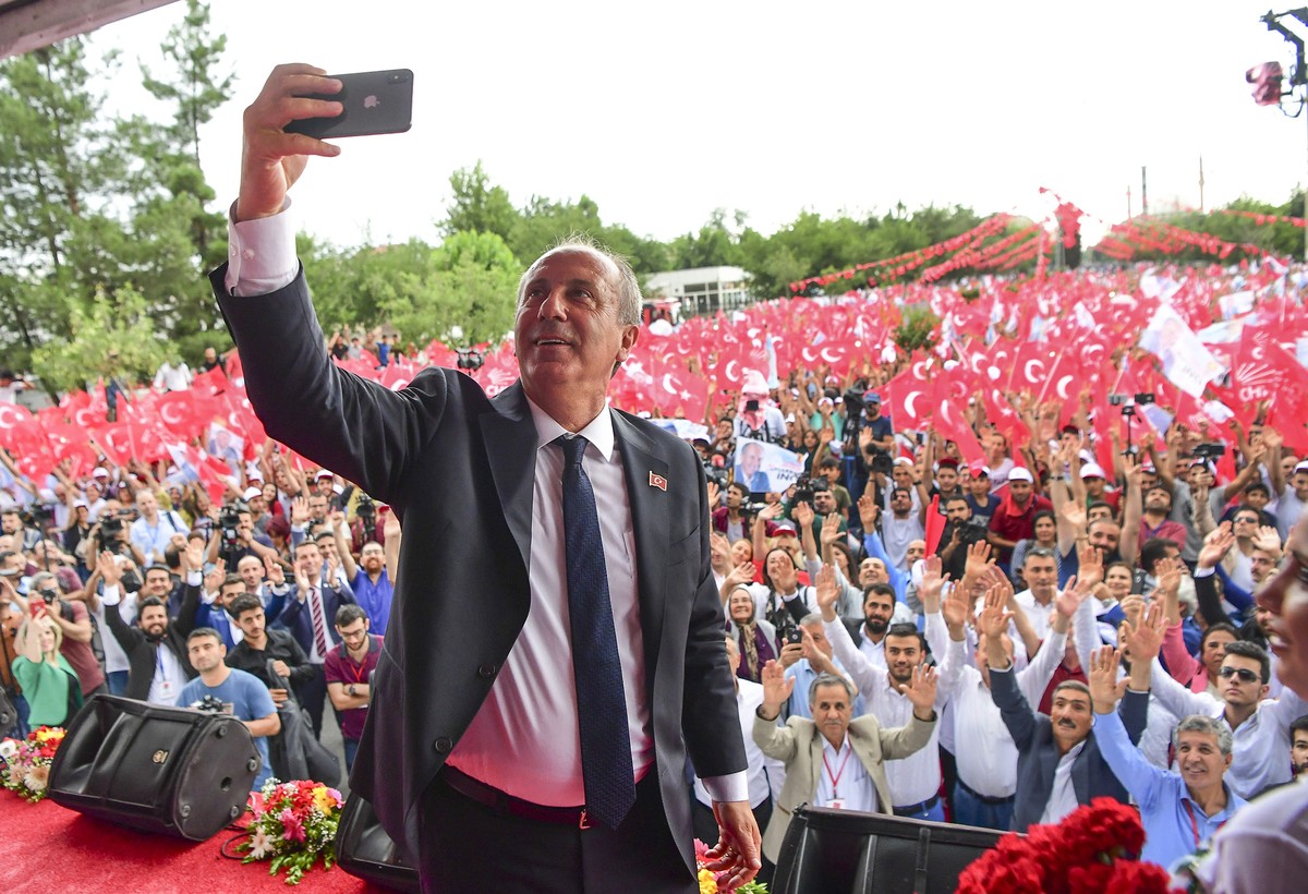 Muharrem Ince, presidential candidate of Turkey's main opposition Republican People's Party, takes a pictures as he addresses an election rally in Diyarbakir, Turkey, Monday, June 11, 2018.  ...