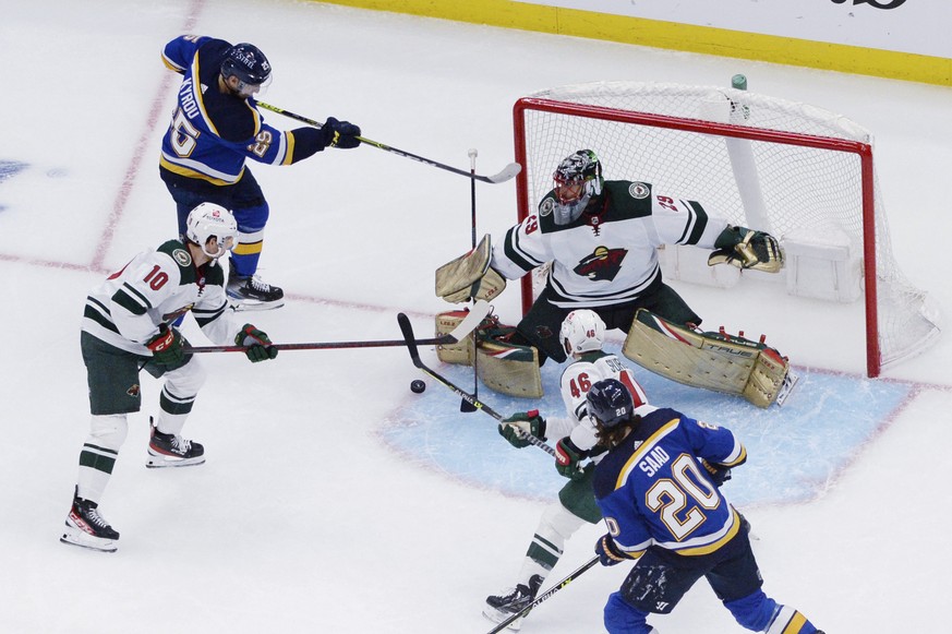 Minnesota Wild goaltender Marc-Andre Fleury (29) makes a save against St. Louis Blues center Jordan Kyrou (25) during the third period in Game 3 of an NHL hockey Stanley Cup first-round playoff series ...