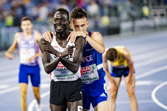 Gold medalist Dominic Lobalu of Switzerland celebrates during the men&#039;s 10000 meters final at the European Athletics Championships, in the Olympic stadium, in Rome, Italy, Wednesday, June 12, 202 ...