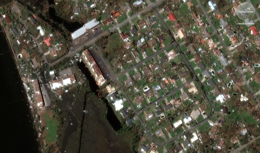 epa07090768 A handout satellite photo made available by DigitalGlobe on 13 October 2018 shows aerial view of Panama City, Florida, USA, 12 October 2018, after hurricane Michael hit the area. Category  ...