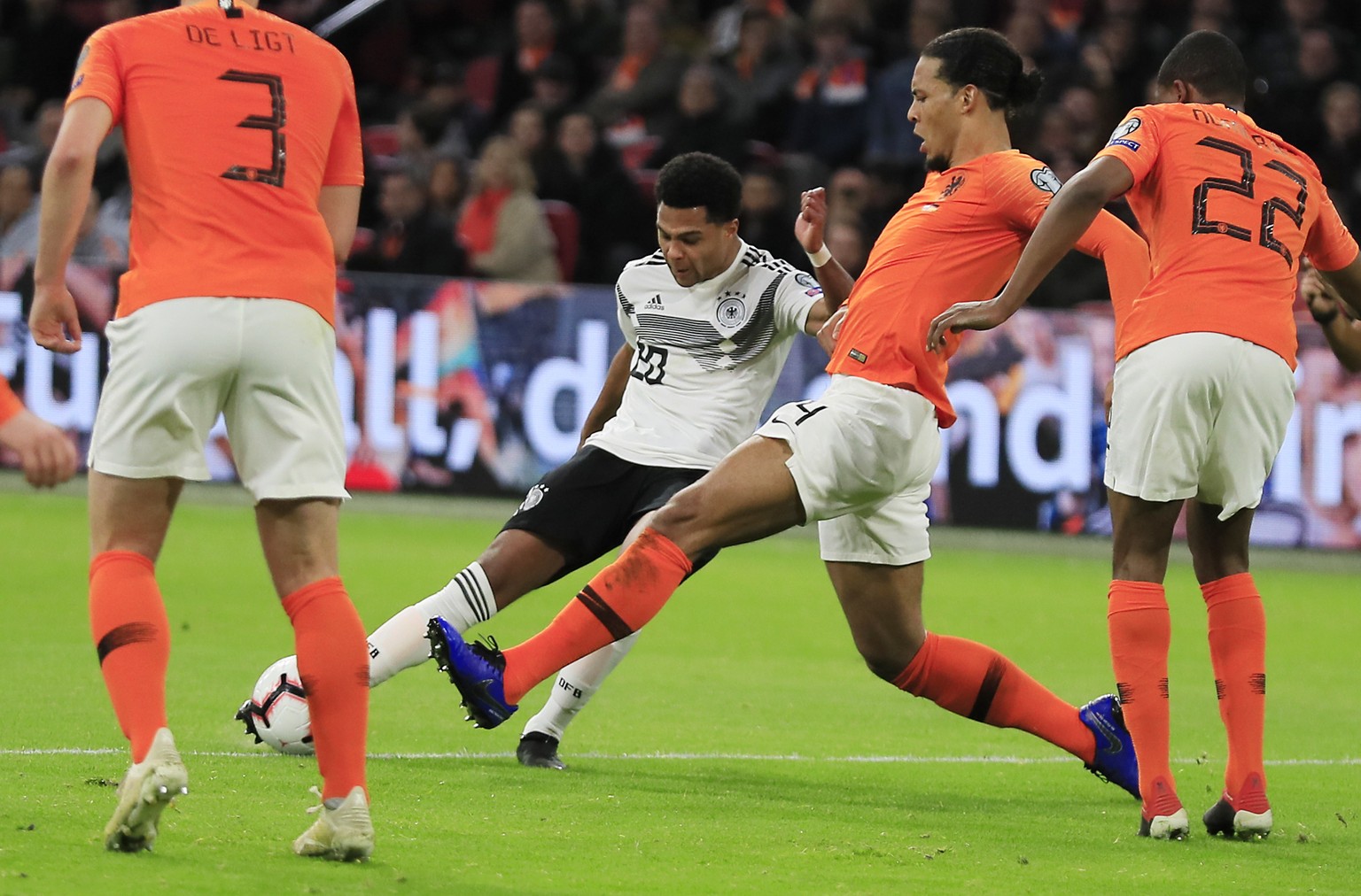 Germany&#039;s Serge Gnabry, third from right, scores his side&#039;s second goal during the Euro 2020 group C qualifying soccer match between Netherlands and Germany at the Johan Cruyff ArenA in Amst ...