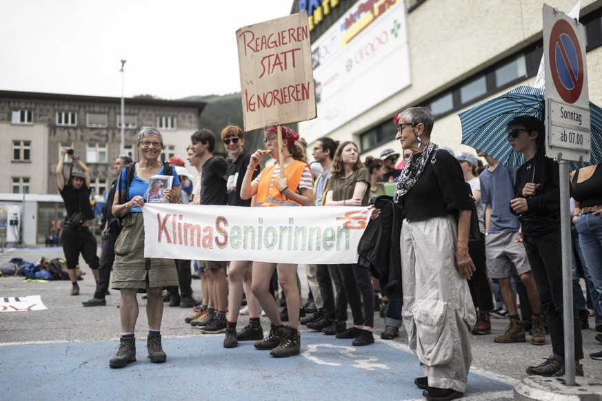 Protesters against the WEF are pictured during a demonstration on the sideline of the 51st annual meeting of the World Economic Forum, WEF, on Sunday, May 22, 2022, in Davos, Switzerland. The forum ha ...