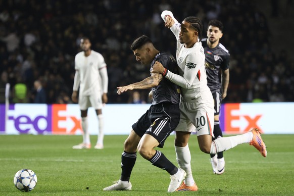 Qarabag&#039;s Pedro Bicalho, left, and Chelsea&#039;s Joao Pedro fight for the ball during the Champions League opening phase soccer match between Qarabag and Chelsea in Baku, Azerbaijan, Wednesday,  ...