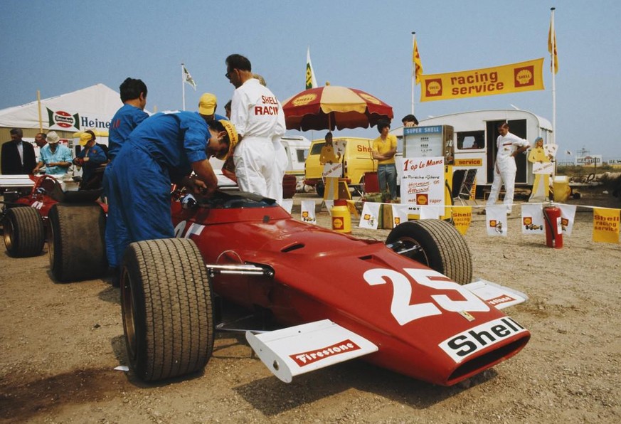 IMAGO / Motorsport Images

1970 Dutch GP ZANDVOORT, NETHERLANDS - JUNE 21: Mechanics refuel the Ferrari 312B of Jacky Ickx in the paddock during the Dutch GP at Zandvoort on June 21, 1970 in Zandvoort ...