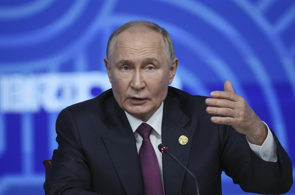 Russian President Vladimir Putin holds a press conference at BRICS Summit in Kazan, Russia, Thursday, Oct. 24, 2024. (Maxim Shipenkov, Pool Photo via AP)
