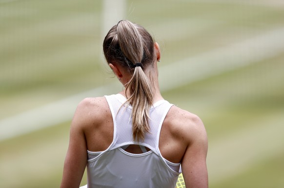 epa06084707 Magdalena Rybarikova of Slovakia in action against Garbine Muguruza of Spain during their semi final match for the Wimbledon Championships at the All England Lawn Tennis Club, in London, B ...