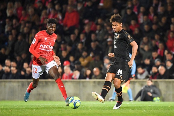 04 BOUBACAR KAMARA OM - 12 LAMINE FOMBA NIM FOOTBALL : Nimes vs Marseille - Ligue 1 Conforama - 28/02/2020 FEP/Panoramic PUBLICATIONxNOTxINxFRAxITAxBEL