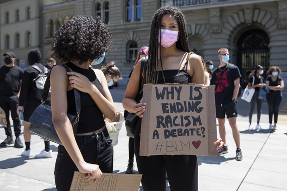 epa08482954 People protest against racism in light of the recent death of George Floyd, in Bern, Switzerland, 13 June 2020. Floyd, a 46-year-old African-American man, died on 25 May after being detain ...