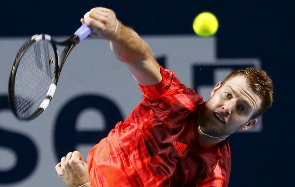 Jack Sock of the U.S. serves the ball to his compatriot Donald Young during their match at the Swiss Indoors ATP men&#039;s tennis tournament in Basel, Switzerland October 30, 2015. REUTERS/Arnd Wiegm ...