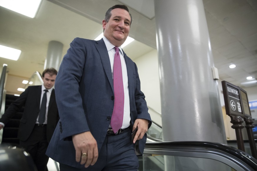 Sen. Ted Cruz, R-Texas returns to his office on Capitol Hill in Washington, Wednesday, Aug. 2, 2017, as work in the Senate begins to wind down toward the August recess. (AP Photo/J. Scott Applewhite)