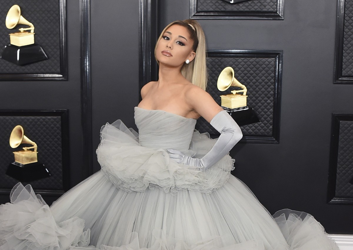 FILE - Ariana Grande appears at the 62nd annual Grammy Awards in Los Angeles, Jan. 26, 2020. More than 250 survivors of the suicide bombing that killed 22 people at a 2017 Ariana Grande concert in Man ...
