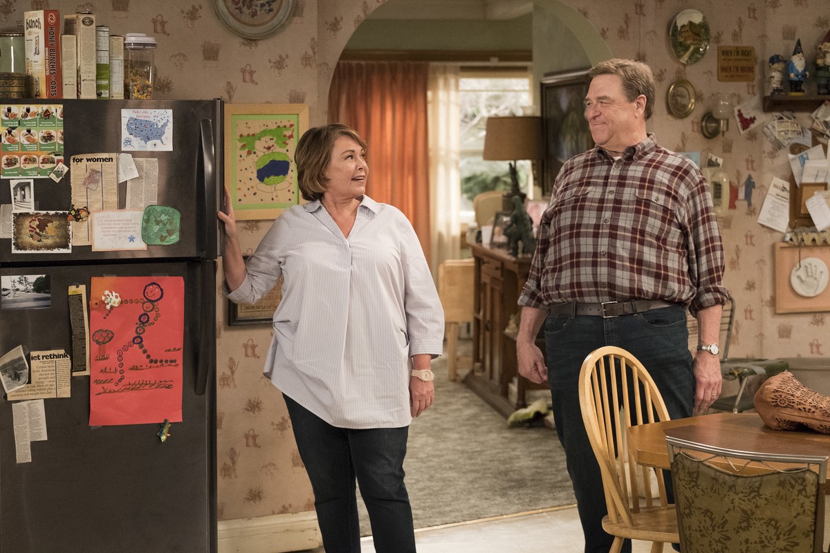 This image released by ABC shows Roseanne Barr, left, and John Goodman in a scene from the comedy series "Roseanne." Expect "Roseanne" to cool it on politics and concentrate on fam ...