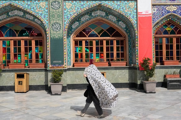 A woman walks at the shrine of Saint Saleh during the Muslim holy fasting month of Ramadan in northern Tehran, Iran, Thursday, Feb. 19, 2026. (AP Photo/Vahid Salemi)
Iran Ramadan