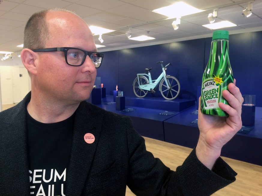 In this photo taken on Thursday, June 1, 2017, Samuel West, curator of the Museum of Failure, holds a bottle of Heinz ‘Green Sauce’ tomato ketchup at the Museum of Failure in Helsingborg, Sweden. Gree ...