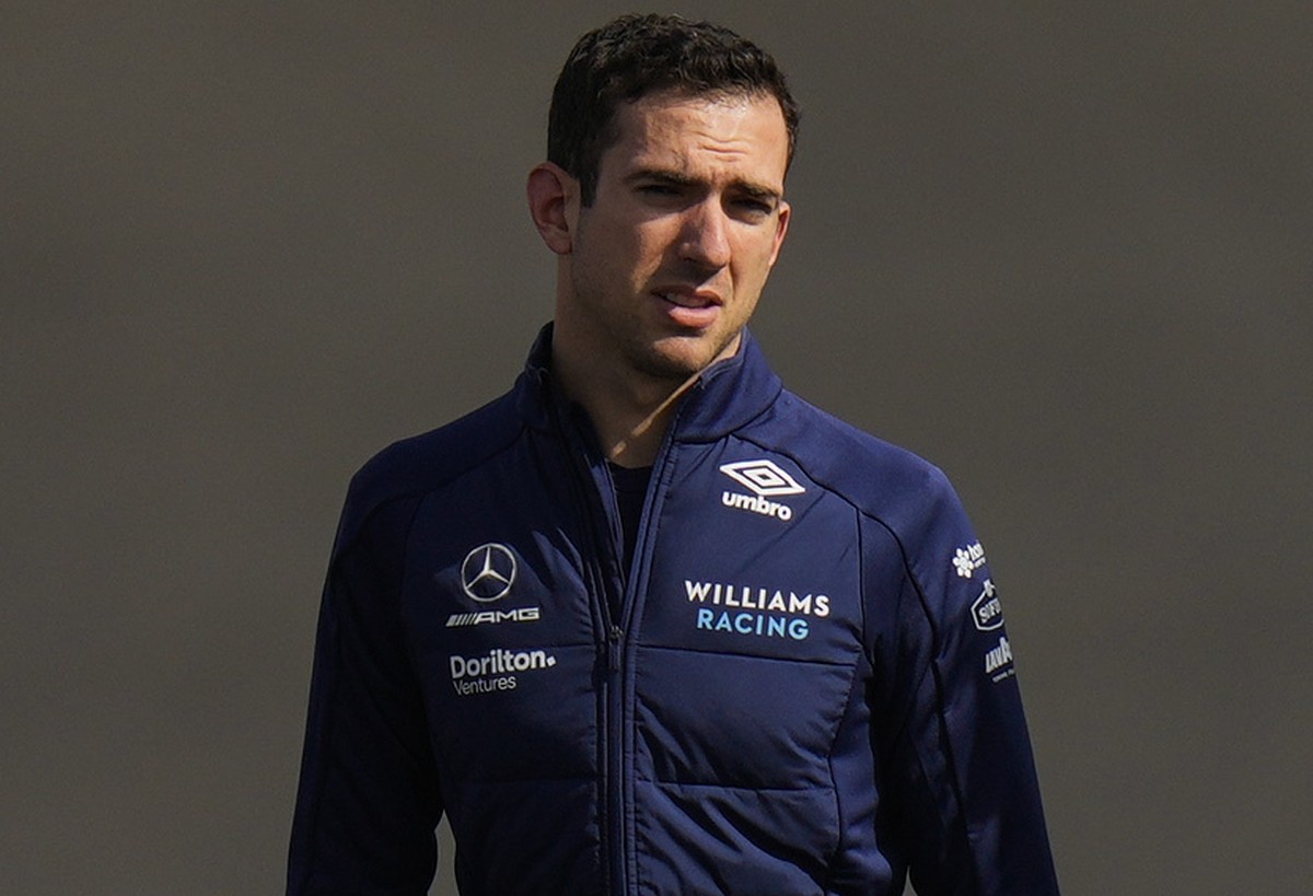 Williams driver Nicholas Latifi, center, of Canada and members of his team walk the track ahead of Sunday's Formula One Turkish Grand Prix at the Intercity Istanbul Park track, outside Istanbul,  ...