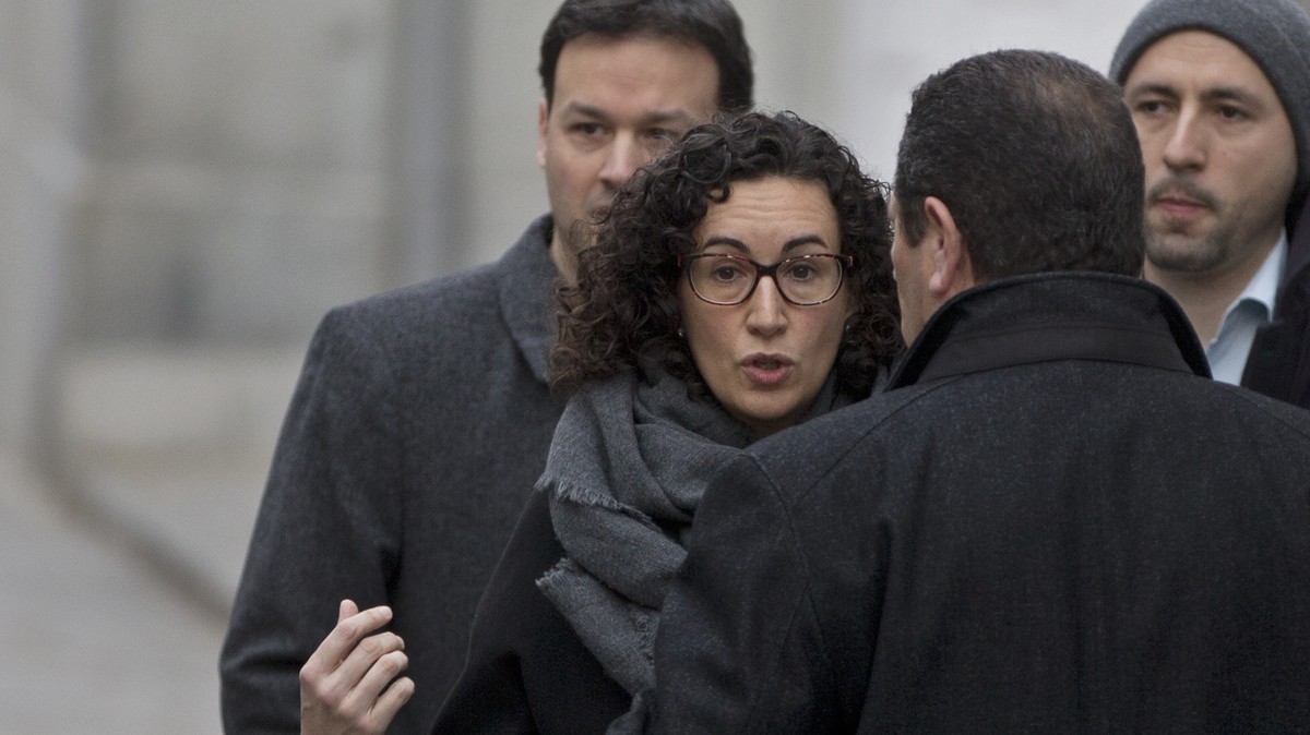FILE - In this Feb. 19, 2018 file photo, Catalan separatist politician and left-republican ERC party's Marta Rovira arrives at the Supreme court for questioning in Madrid, Spain. Marta Rovira, a  ...