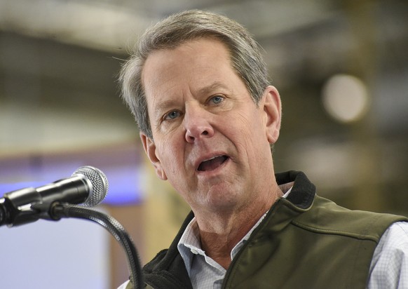 FILE - Georgia Gov. Brian Kemp speaks at the Roper Corporation Cooking Products Plant in Lafayette, Ga. on on, Jan. 7, 2022. Locked in a bitter Georgia Republican gubernatorial primary, incumbent Kemp ...