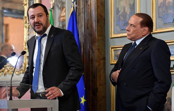 Leader of The League party, Matteo Salvini, left, is flanked by Forza Italia party&#039;s leader Silvio Berlusconi as they address the media after meeting Senate president Maria Elisabetta Alberti Cas ...