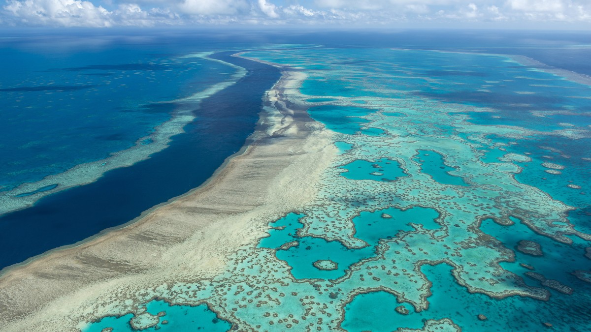 FILE - In this undated photo provided by the Great Barrier Reef Marine Park Authority, the Great Barrier Reef near the Whitsunday, Australia, region is viewed from the air. A United Nations-backed mis ...