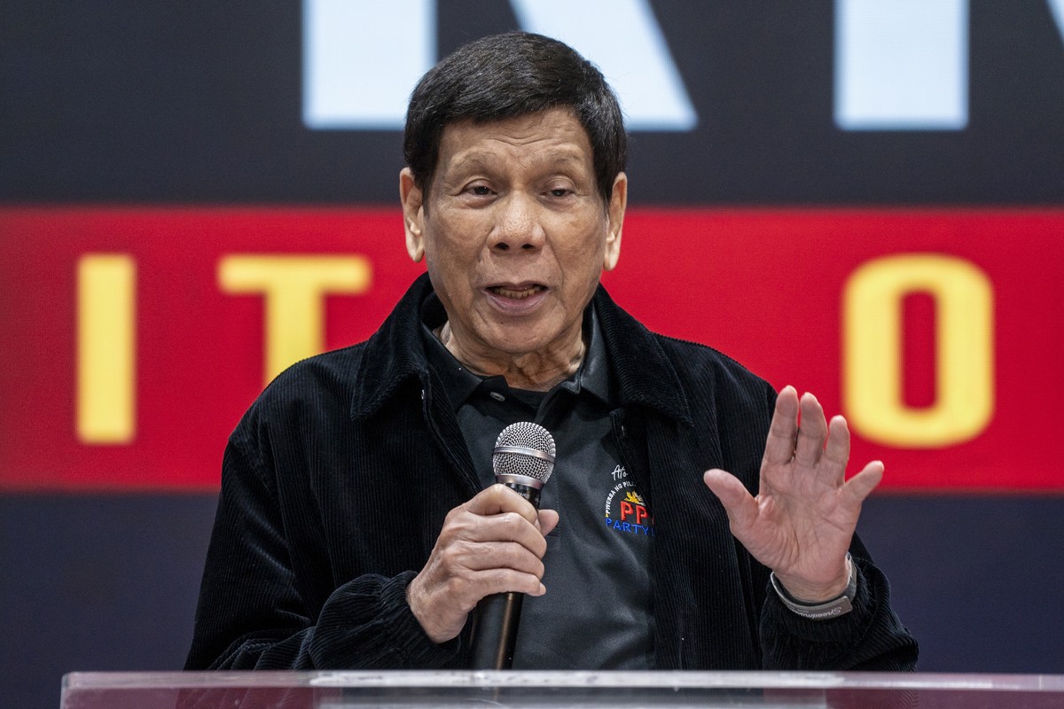 Former President of the Philippines Rodrigo Duterte speaks inside the Southorn Stadium during a thanksgiving gathering organized by Hong Kong-based Filipino workers for the former populist president i ...