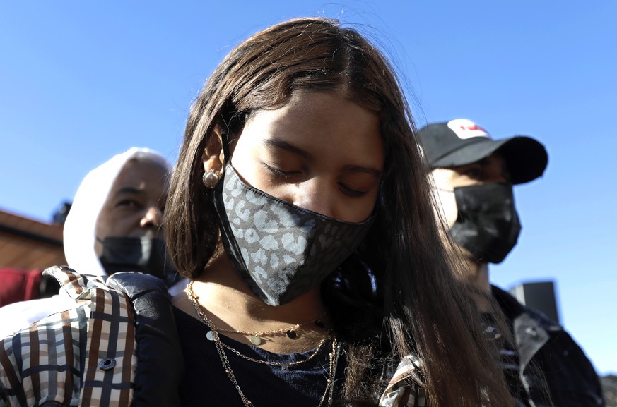 epa09117711 A fan shows support for the rapper DMX during a prayer vigil outside of the White Plains Hospital in White Plains, New York, USA, 05 April 2021. Earl Simmons, who is better known by his pr ...