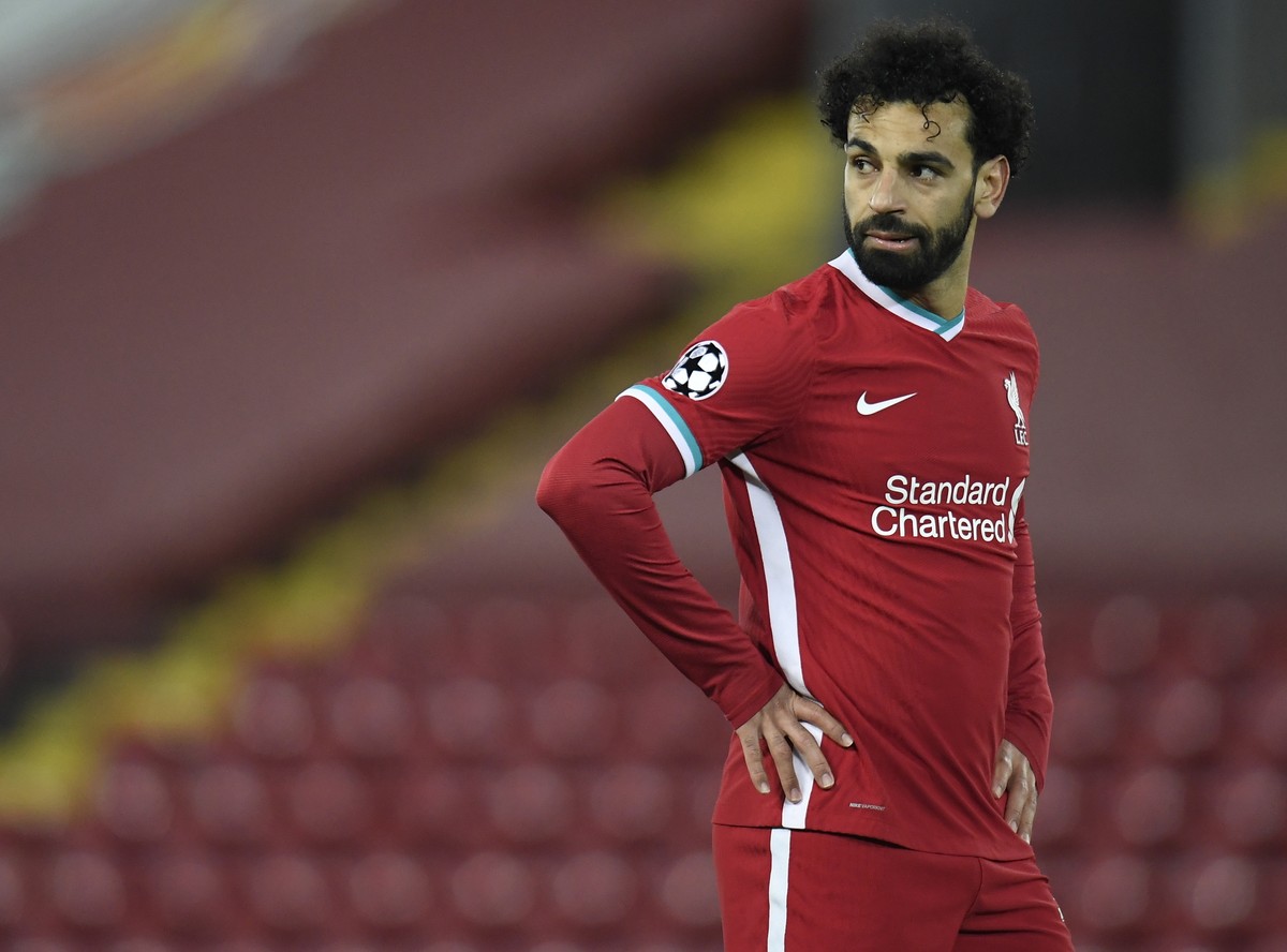 epa09135866 Liverpool's Mohamed Salah reacts during the UEFA Champions League quarter final, second leg soccer match between Liverpool FC and Real Madrid in Liverpool, Britain, 14 April 2021. EPA ...
