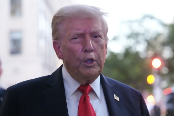 President Donald Trump speaks to reporters before he enters a restaurant near the White House, Tuesday, Sept. 9, 2025, in Washington, to have dinner. (AP Photo/Alex Brandon)
Donald Trump
