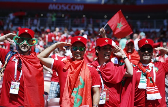 Morocco fans salute prior to the group B match between Portugal and Morocco at the 2018 soccer World Cup in the Luzhniki Stadium in Moscow, Russia, Wednesday, June 20, 2018. (AP Photo/Hassan Ammar)