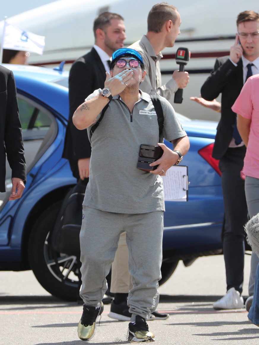 epa06892943 Argentinian soccer legend Diego Maradona reacts upon his arrival at Brest airport, Belarus, 16 July 2018. Maradona has been appointed as chairman of Belarussian soccer club &#039;Dinamo Br ...