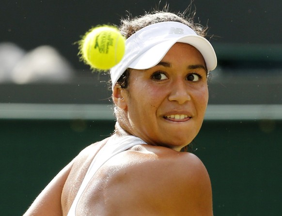 Heather Watson of Britain keeps her eye on the ball during her match against Daniela Hantuchova of Slovakia at the Wimbledon Tennis Championships in London, July 1, 2015. REUTERS/Suzanne Plunkett