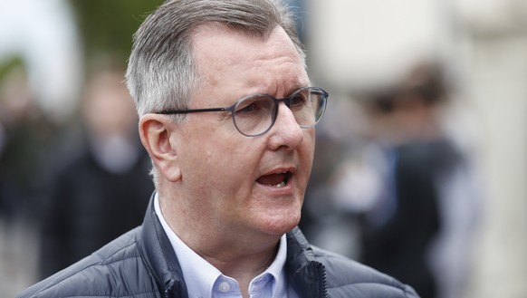 Jeffrey Donaldson leader of the Democratic Unionist Party speaks to the media while out canvassing in Holywood on the outskirts of Belfast, Northern Ireland, Monday, May 2, 2022. The DUP leader was ou ...