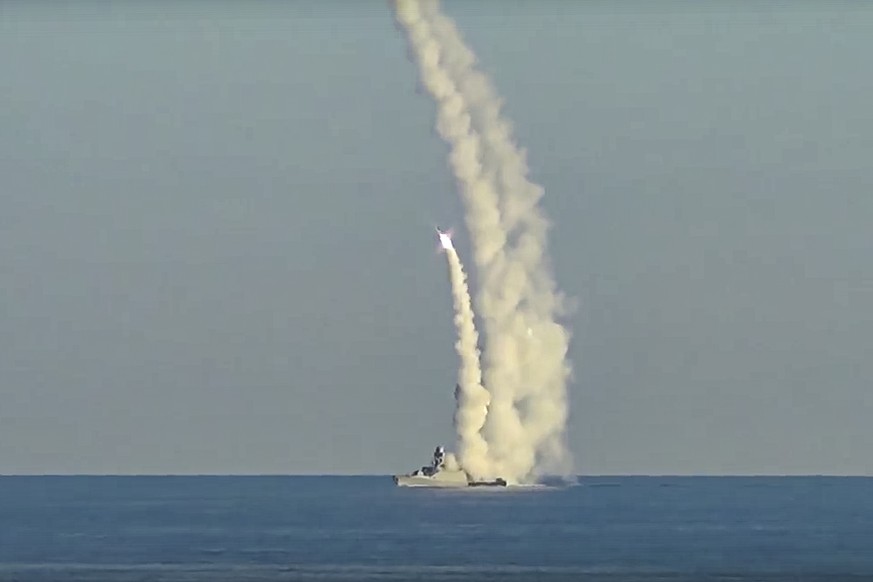 This handout photo taken from video released by Russian Defense Ministry Press Service on Friday, July 15, 2022 shows a long-range Kalibr cruise missiles launched by a Russian military ship from an un ...