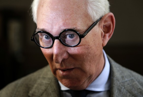 Roger Stone talks to reporters outside a courtroom in New York, Thursday, March 30, 2017. Stone, a longtime political provocateur and adviser to President Donald Trump, is being sued over a flyer sent ...