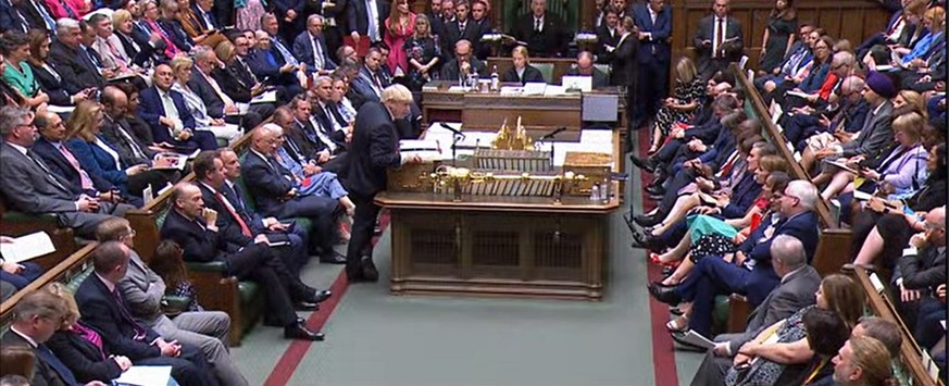 epa10054689 A grab made from footage provided by UK Paliament TV shows British Prime Minister Boris Johnson during Prime Minister&#039;s Questions in the House of Commons, London, 06 July 2022. Johnso ...