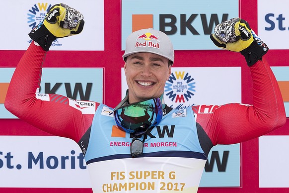 Gold medalist Erik Guay of Canada celebrate on the podium during the Winner's Presentation in the finish area after during the men Super-G winnerÕs presentation at the 2017 FIS Alpine Skiing Worl ...