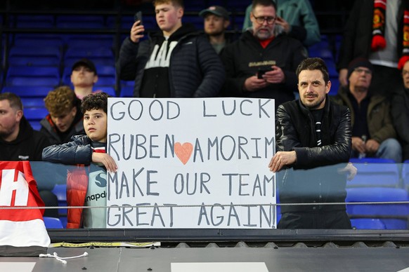 Manchester United, ManU supporters hold a good luck banner for new Manchester United head coach Ruben Amorim in the stands before the game Ipswich Town v Manchester United, Premier League, Football, P ...