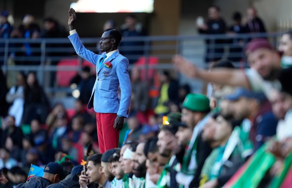 Michel Nkuka Mboladinga, a DR Congo fan impersonating late Congolese leader Patrice Lumumba poses before the Africa Cup of Nations round of 16 soccer match between Algeria and DR Congo in Rabat, Moroc ...