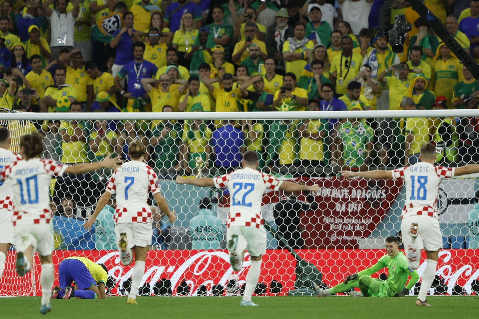 Croatian players react to winning today, in a match of the quarterfinals of the Qatar 2022 World Cup at the Education City stadium in Rayyan, Qatar 09 December 2022. Soccer World Cup 2022: Croatia - B ...