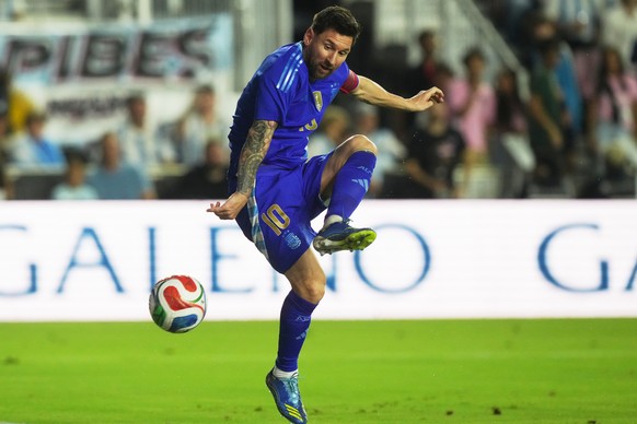 Argentina&#039;s Lionel Messi (10) attempts a shot on goal during the first half of a friendly soccer match against Puerto Rico, Tuesday, Oct. 14, 2025, in Fort Lauderdale, Fla. (AP Photo/Marta Lavand ...