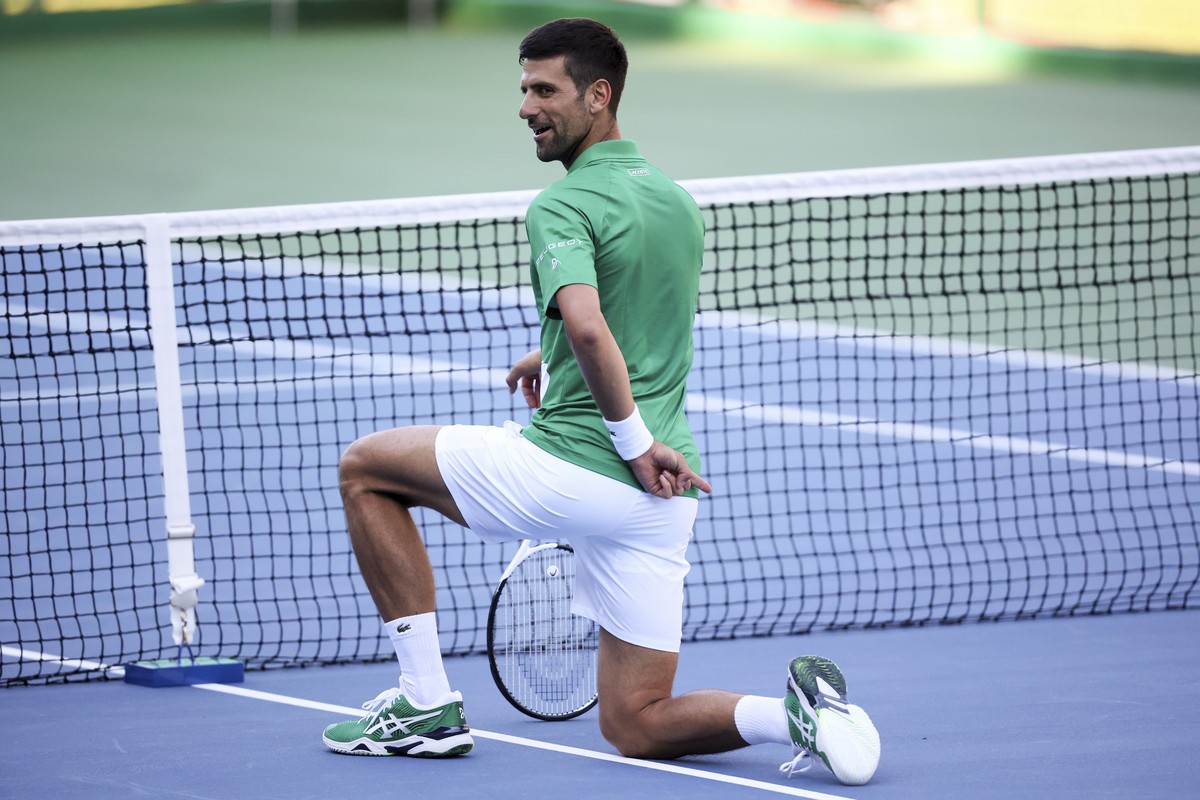 Serbia's Novak Djokovic gestures while playing a double exhibition match in Visoko, Bosnia, Wednesday, July 13, 2022. (AP Photo/Armin Durgut)