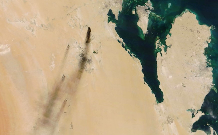 epa07844126 A handout photo made available by NASA Worldview shows a satellite image of smoke from fires at two major oil installations in eastern Saudi Arabia, 14 September 2019 (issued 15 September  ...