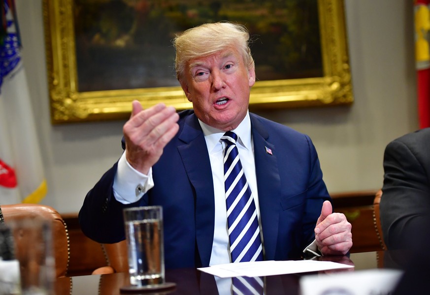 epa06616312 US President Donald J. Trump holds a law enforcement roundtable on sanctuary cities, in the Roosevelt Room at the White House in Washington, DC, USA, 20 March 2018. EPA/KEVIN DIETSCH / POO ...