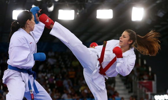 epa04799131 Elena Quirici (R) of Switzerland and Marina Rakovic (L) of Montenegro compete in the women&#039;s karate -68 kg category bronze medal bout during the Baku 2015 European Games in Baku, Azer ...