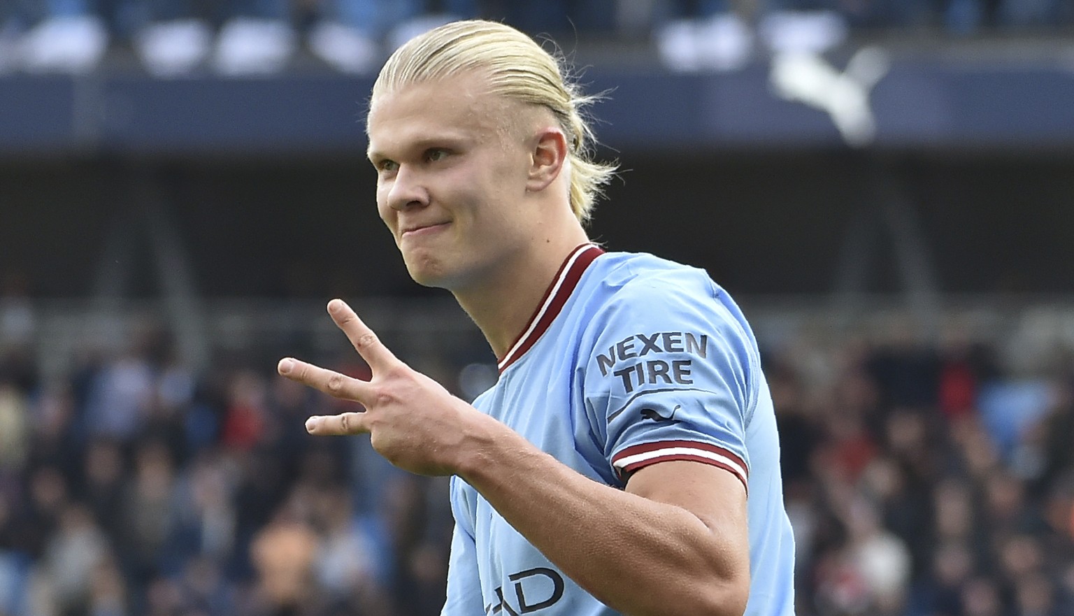 Manchester City&#039;s Erling Haaland, celebrates after scoring his side&#039;s fifth goal and his personal hat trick during the English Premier League soccer match between Manchester City and Manches ...