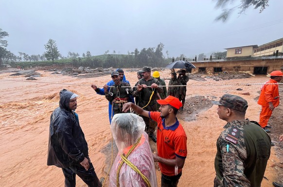 This photograph provided by PRO Defense Kochi shows Indian army soldiers engaged in rescue operations at landslide affected village in Wayanad in southern Kerala, India, Tuesday, July 30, 2024. (PRO D ...