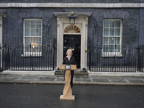 Britain&#039;s Prime Minister Liz Truss reads a statement outside 10 Downing Street, London, Thursday Sept. 8, 2022, following the announcement of the death of Queen Elizabeth II. Queen Elizabeth II,  ...